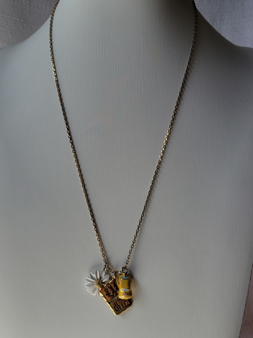 Kate Spade "Off We Go" Daisy & Taxi Pendant Necklace